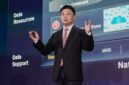 Huawei's Saeed Xia presents onstage at MWC 2026